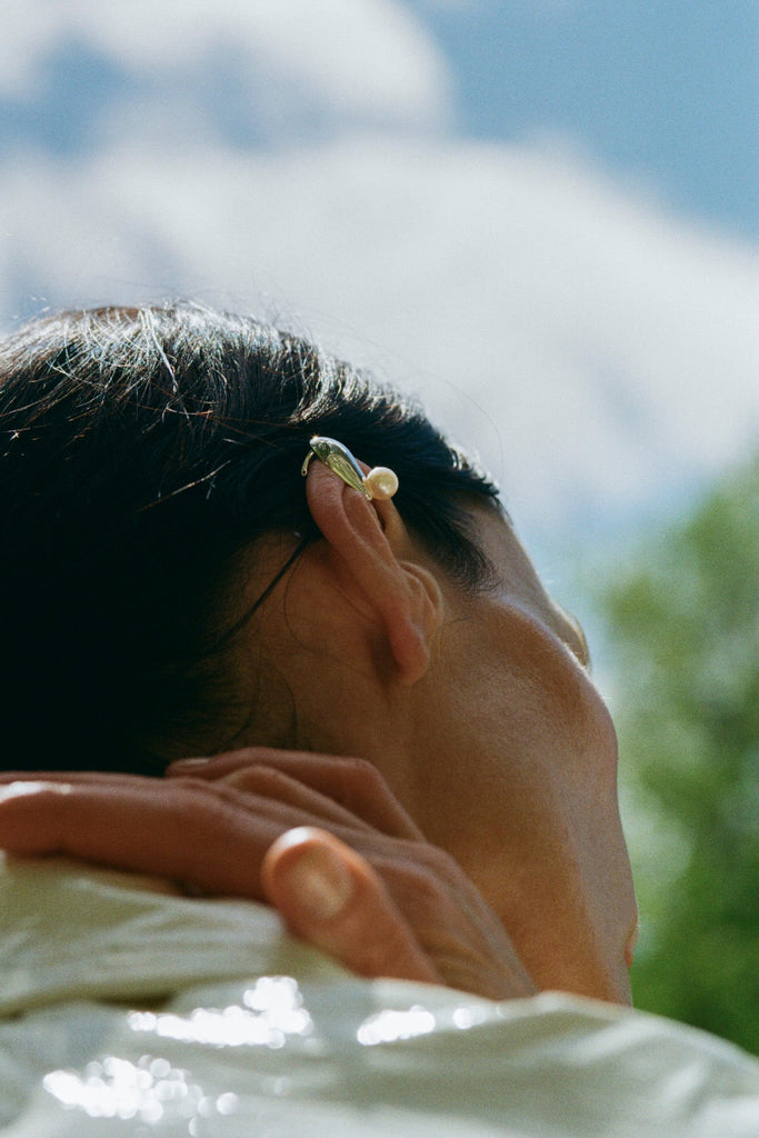 Back view of Agathe Stud with freshwater pearl – sculptural aubergine-inspired earring design by ANNE MANNS