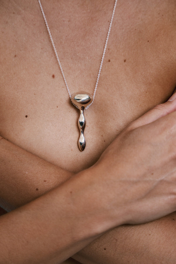Margot mushroom-inspired sterling silver locket by ANNE MANNS